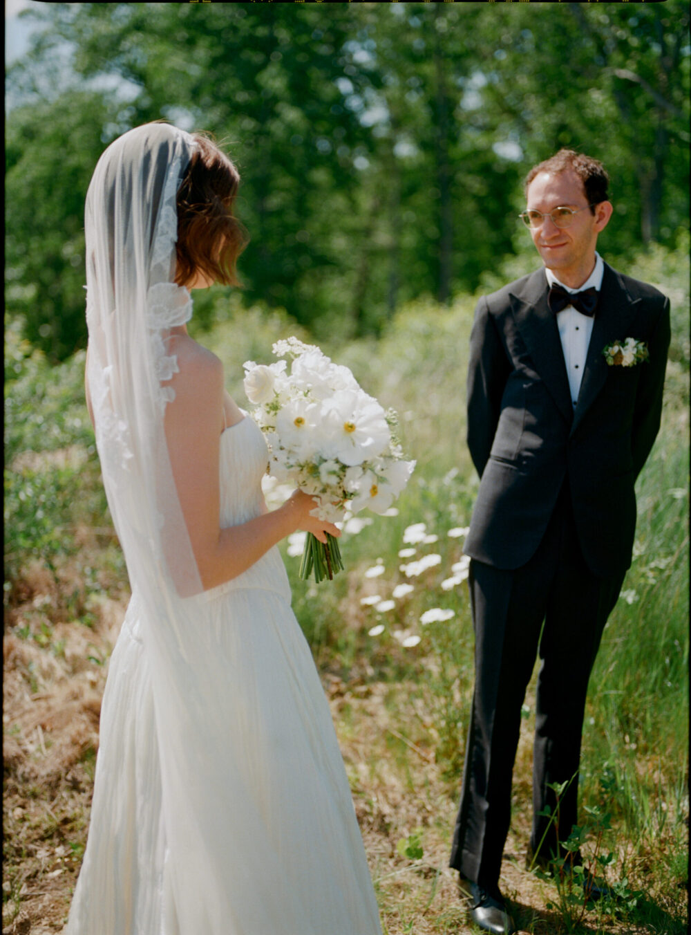 Romantic couple portraits at Kingdom of the Hawk wedding in Connecticut vineyard.