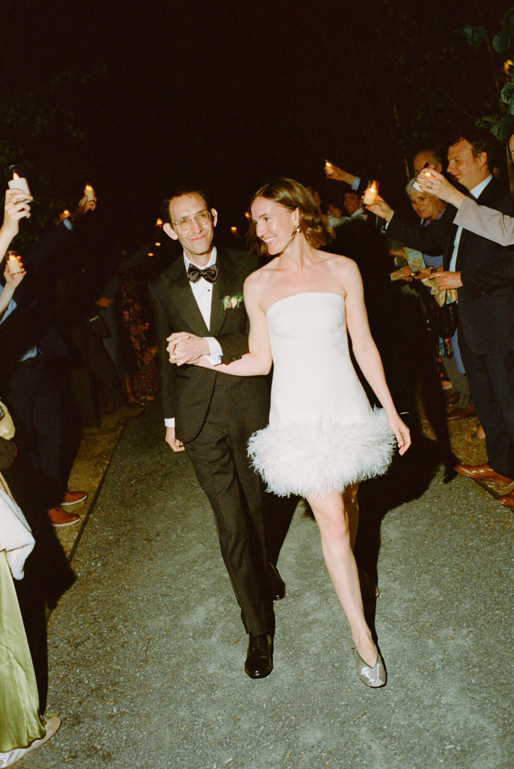 Bride and groom dancing with guests during Kingdom of the Hawk wedding reception in Connecticut.