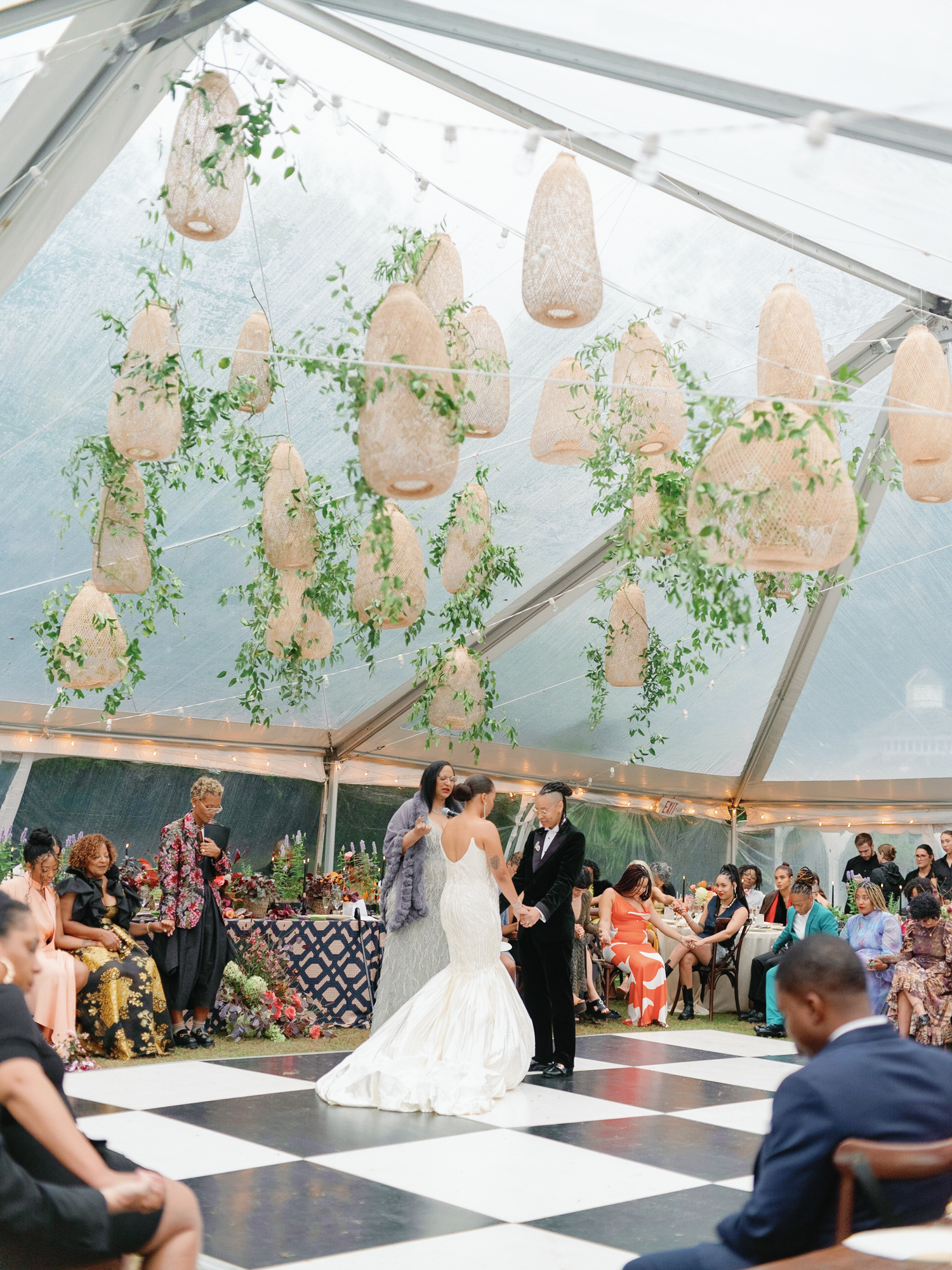Lamberts Cove Inn wedding rain plan with covered ceremony setup under clear-top tent.