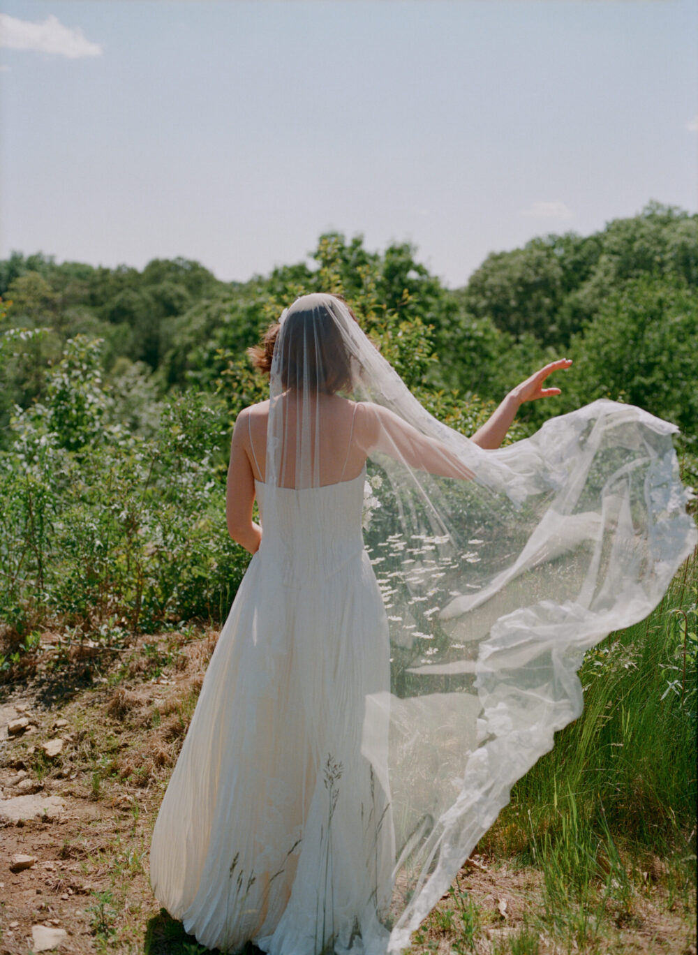 Romantic couple portraits at Kingdom of the Hawk wedding in Connecticut vineyard.