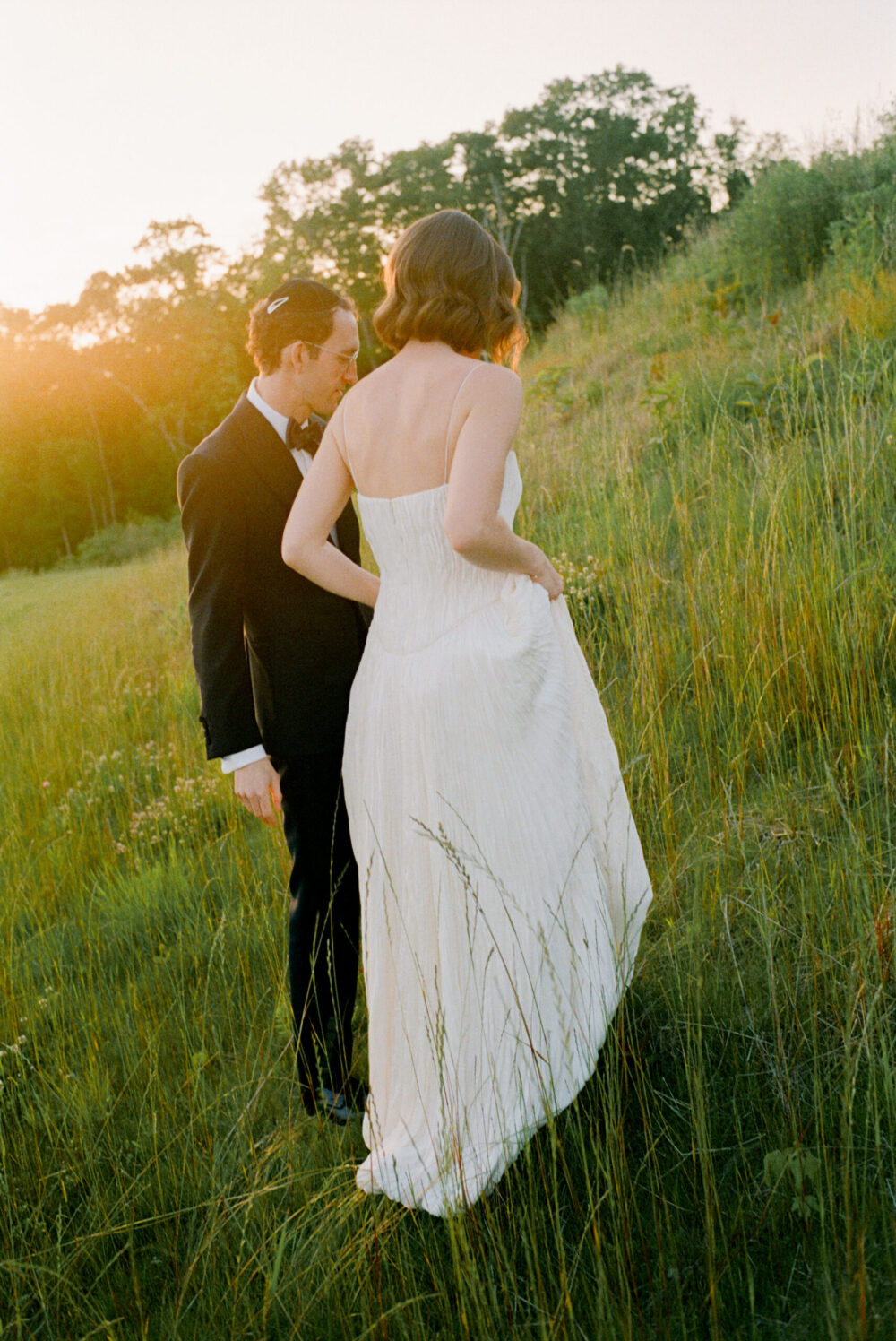 Romantic couple portraits at Kingdom of the Hawk wedding in Connecticut vineyard.