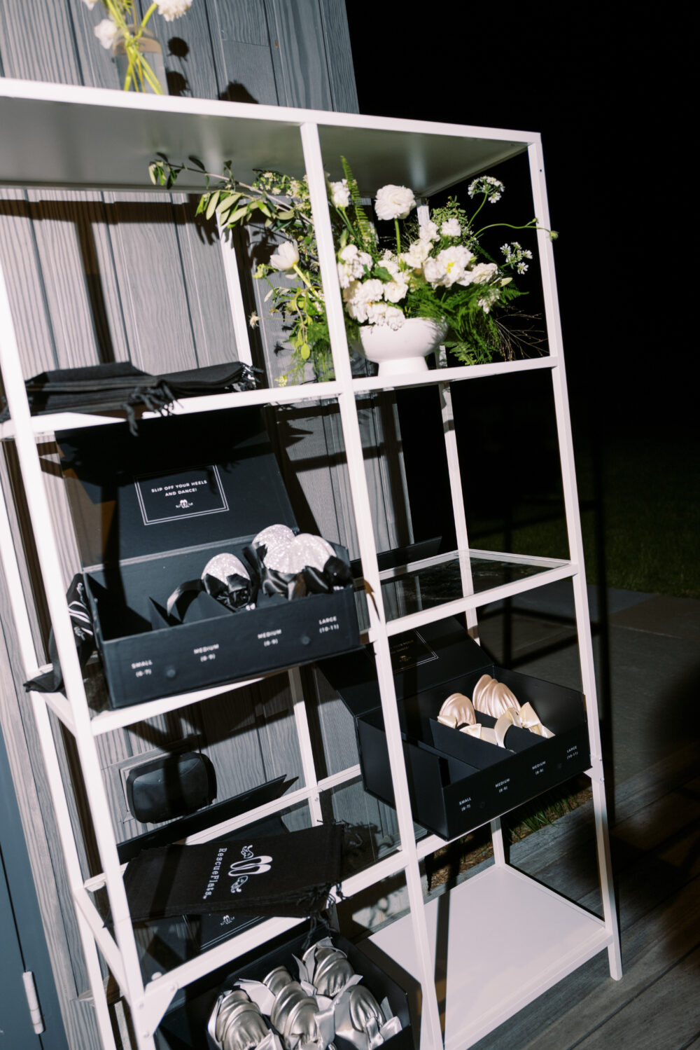 Personalized wedding details at Kingdom of the Hawk, including rescue flats and monogrammed accents