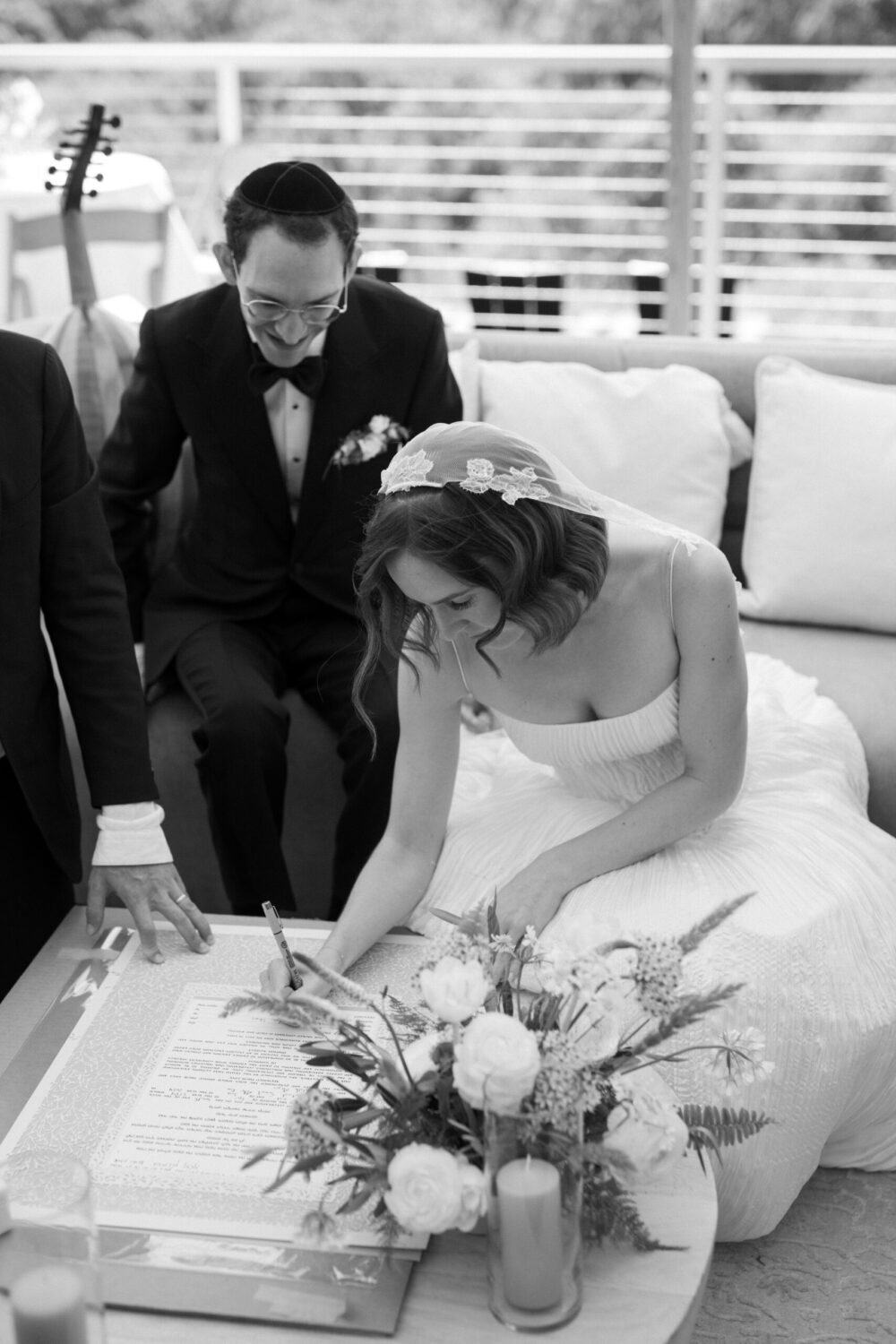 Bride and groom exchange vows at Kingdom of the Hawk wedding ceremony in Connecticut vineyard.